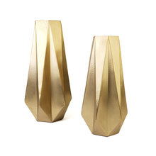 Matching pair of large and medium gold geometric vases